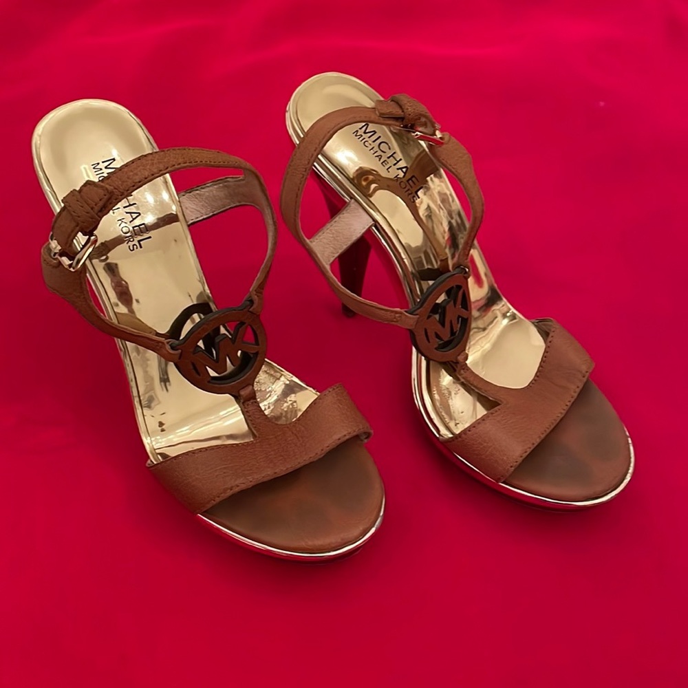Michael Kors brown leather and wood sandals with 5” stiletto heels. (Mlb)